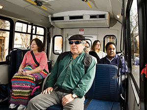 section5-several-passengers-riding-a-MetroAccess-bus